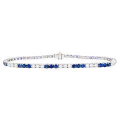 Blue Sapphires and Diamonds Tennis Bracelet Round Cut 5.3 Carats 18K Gold