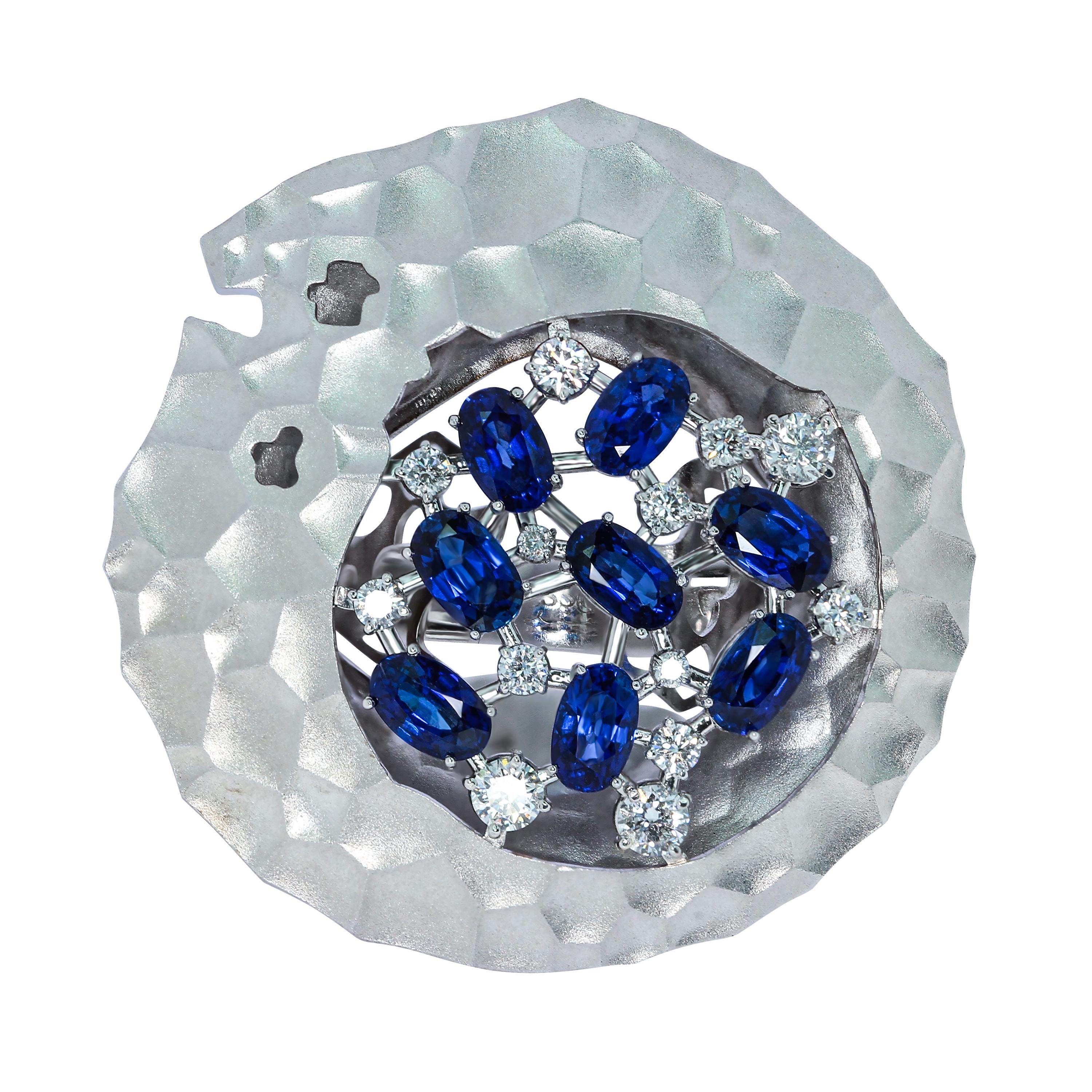 Blue Sapphires Diamonds 18 Karat White Gold Big Oasis Ring
Hot desert - nothing alive around. But it is necessary to appear a sip of water, and life awakens. It was the deserts that inspired our designers to create this Ring. Incredibly dry, the