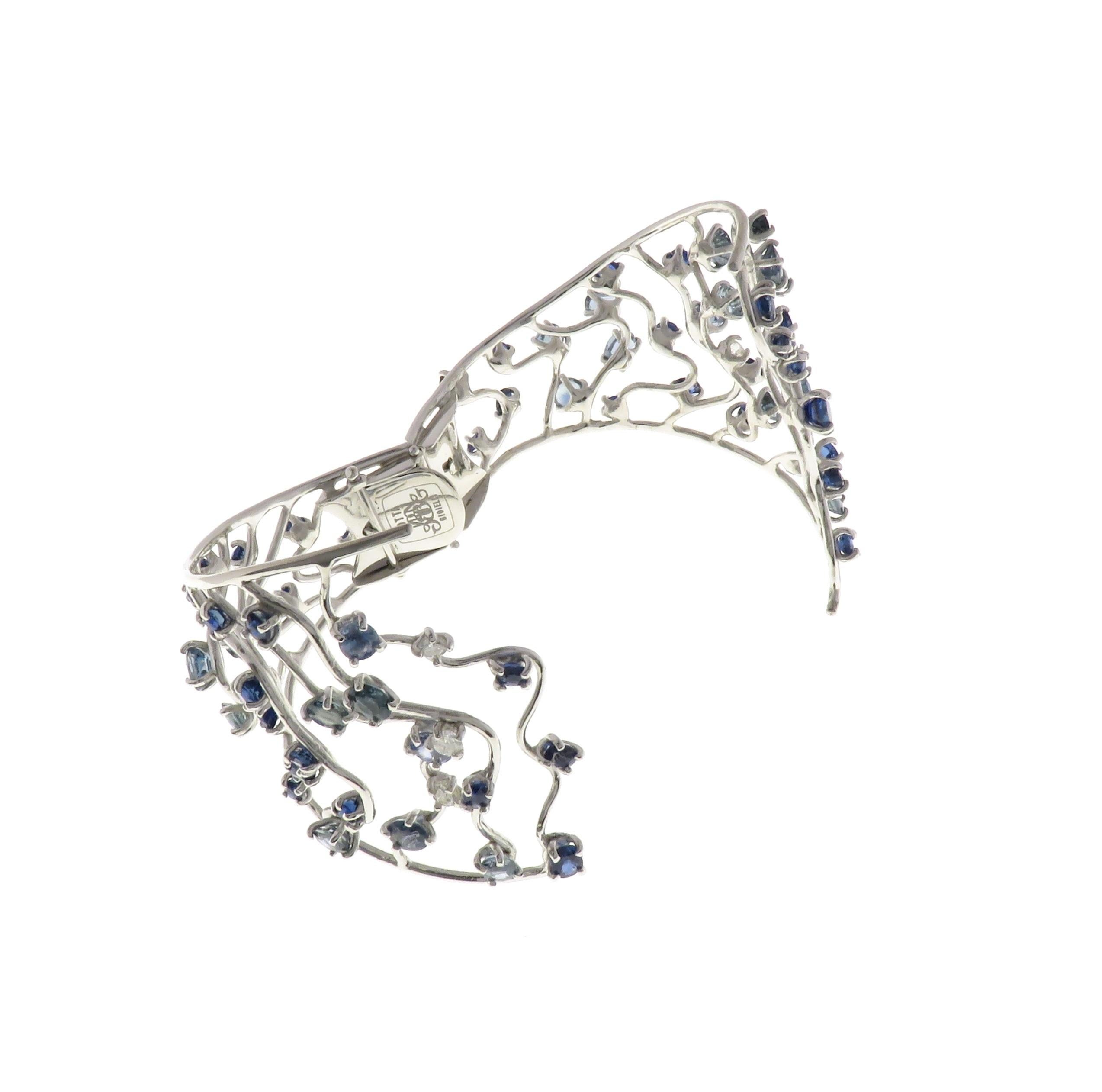 Contemporary Blue Sapphires Diamonds 18 Karat White Gold  Waves Cuff Bracelet Made In Italy For Sale