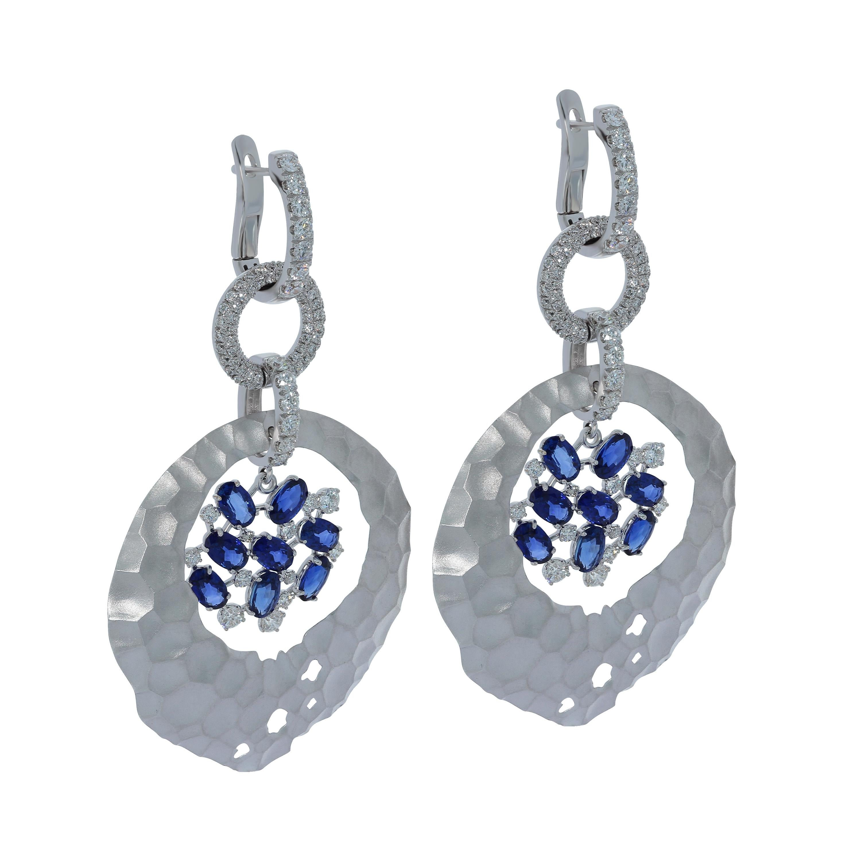 Blue Sapphires Diamonds 18 Karat White Gold Oasis Earrings
Hot desert - nothing alive around. But it is necessary to appear a sip of water, and life awakens. It was the deserts that inspired our designers to create these Earrings. Incredibly dry,