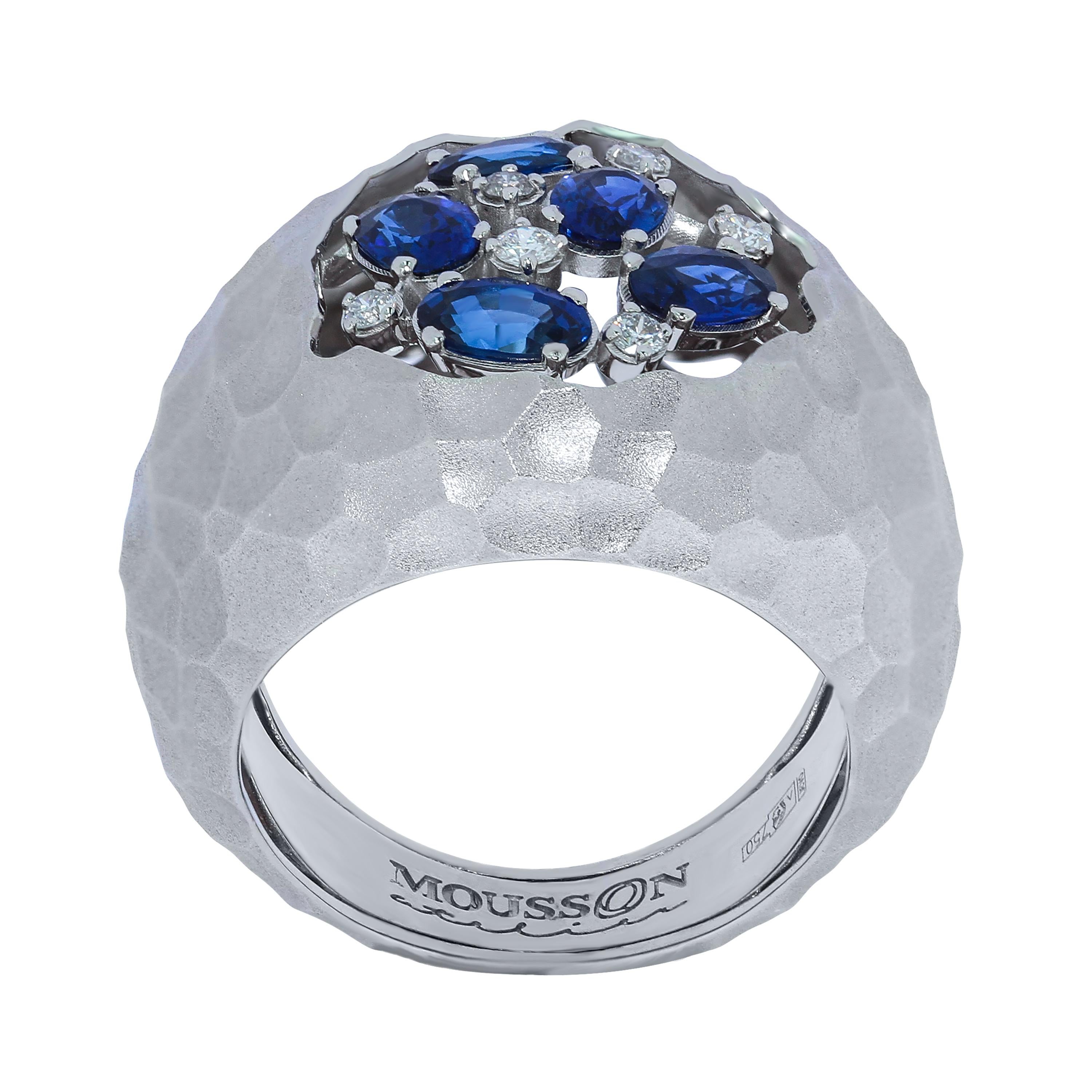 Blue Sapphires Diamonds 18 Karat White Gold Small Oasis Ring
Hot desert - nothing alive around. But it is necessary to appear a sip of water, and life awakens. It was the deserts that inspired our designers to create this Ring. Incredibly dry, the