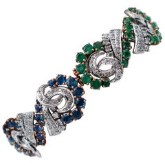 Blue Sapphires, Emeralds, Diamonds, 14 Karat White and Rose Gold Bracelet