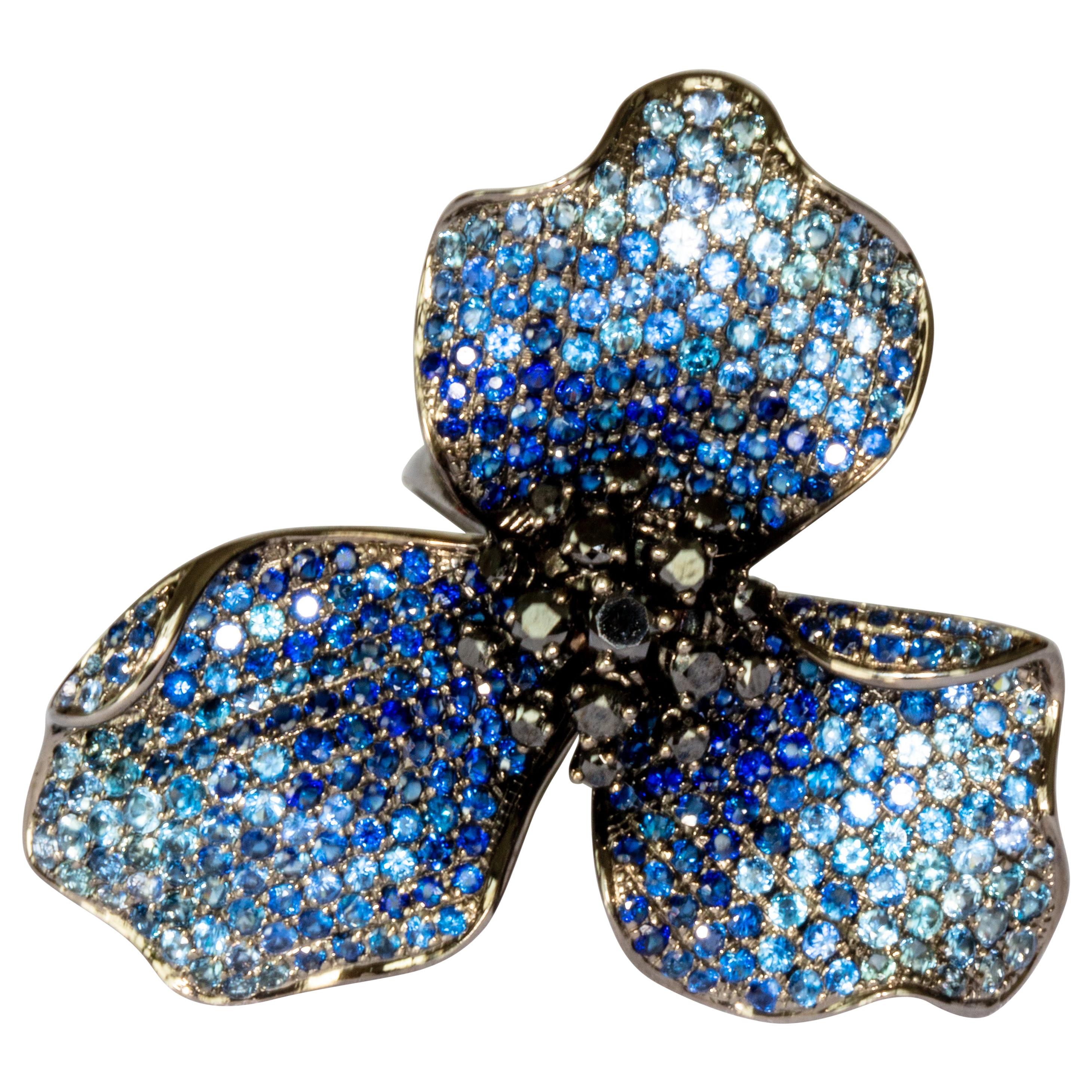 Blue Sapphires Orchid Garden Ring in 18K Gold in Rhodium and Black Diamonds