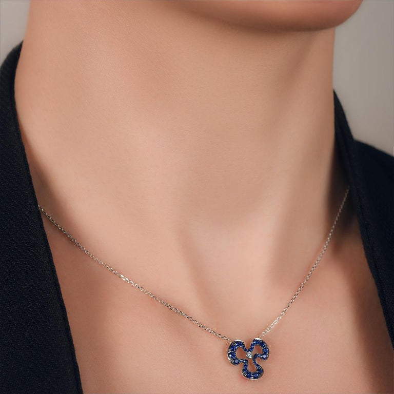 - 1 Round Diamond - 0.04 ct, G-H/VS
- 25 Sapphires – 0.42 ct 
- 14K White Gold 
- Weight: 2.49 g
- Length: 47 cm
Delicate necklace on a thin chain, in the shape of a shamrock, decorated with 0.42 ct sapphires. Chain length 47 cm.
Additional Photos
