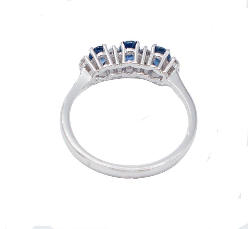 Modern Blue Sapphires, White Diamonds, 18 Karat White Gold Ring