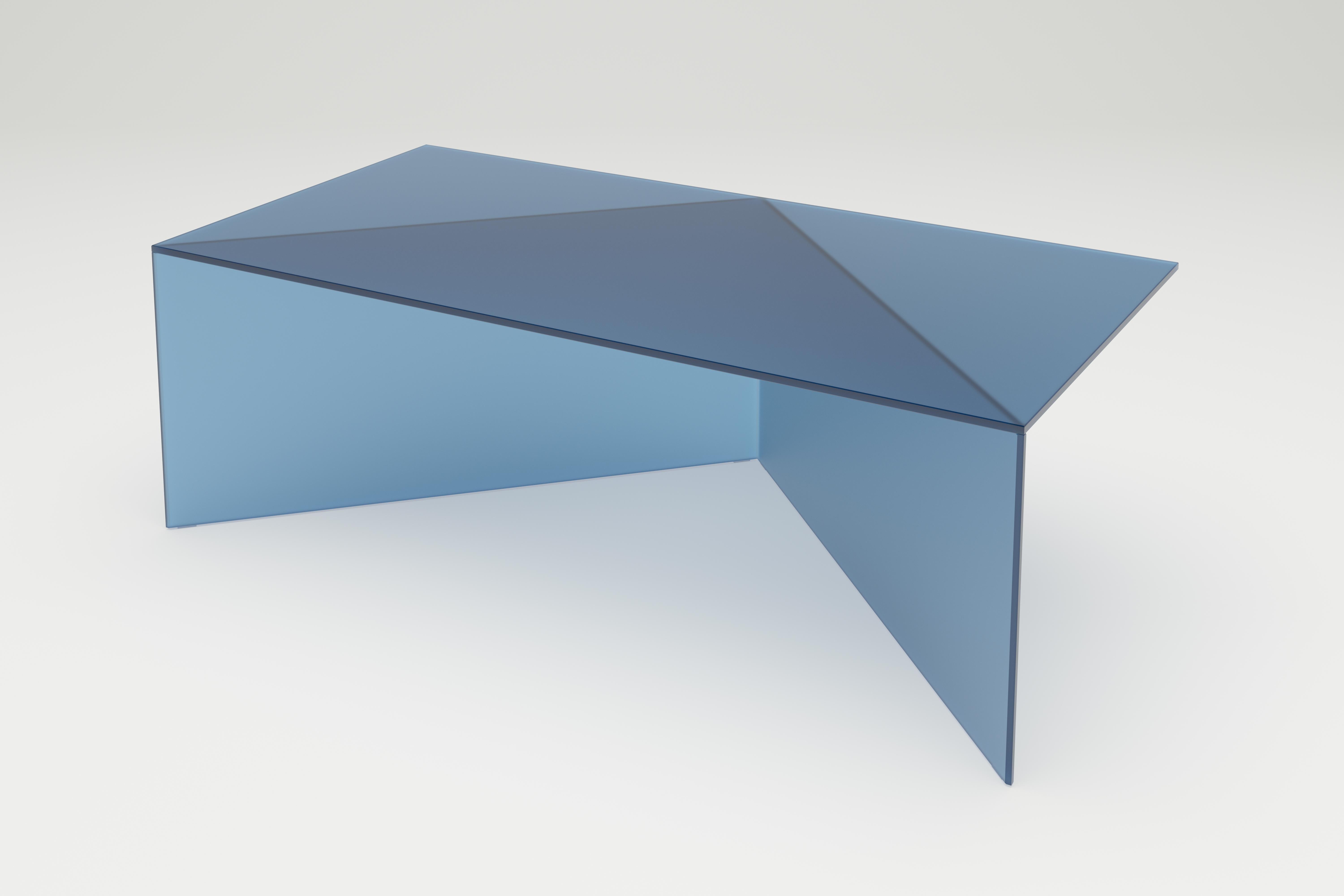 Blue satin glass poly oblong coffe table by Sebastian Scherer
Dimensions: D120 x W30 x H40 cm
Materials: Solid coloured glass.
Weight: 34.4 kg.
Also available: Colours:clear white (transparent) / clear green / clear blue / clear bronze / clear