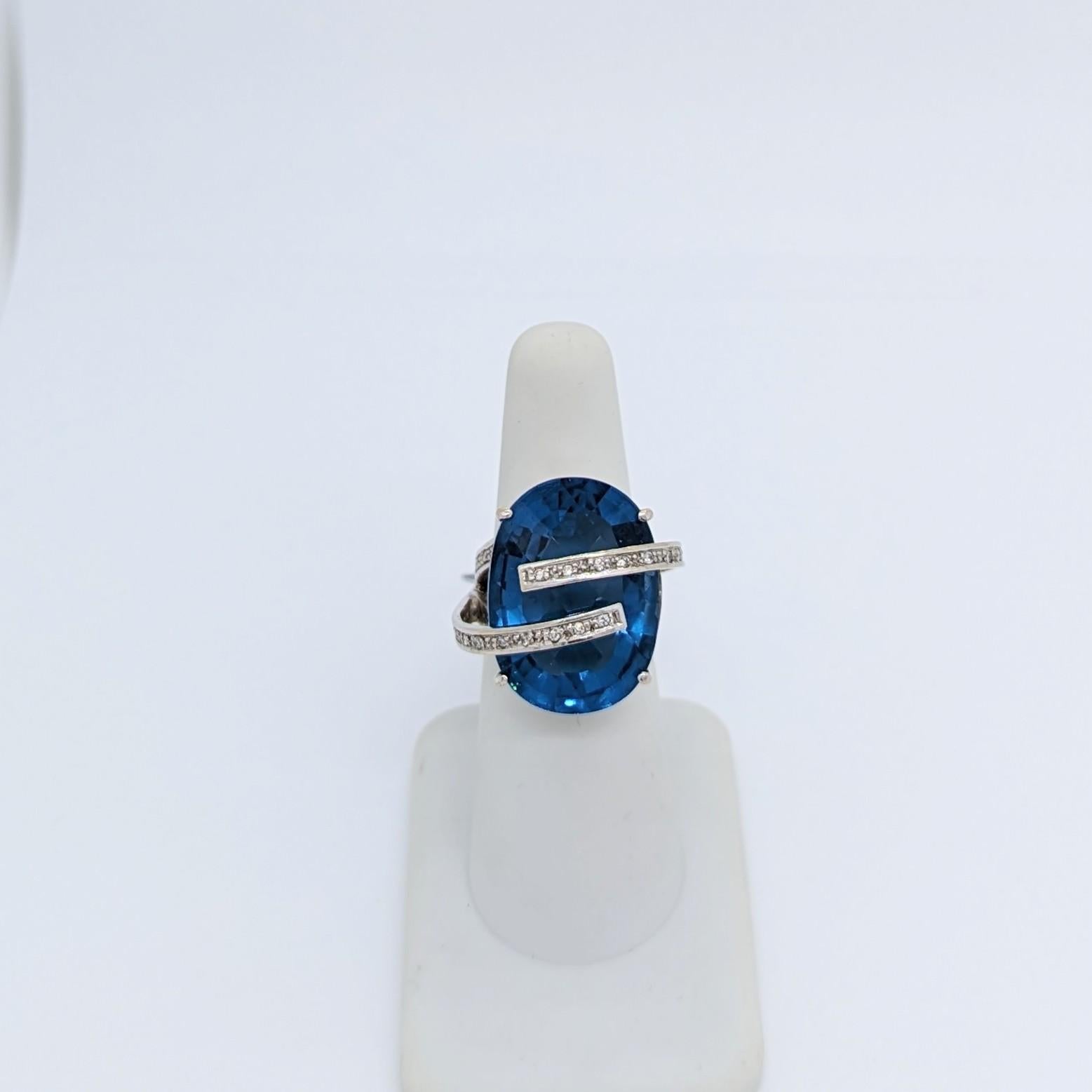 Blue Semi Precious Oval and White Diamond Cocktail Ring in 14K White Gold For Sale