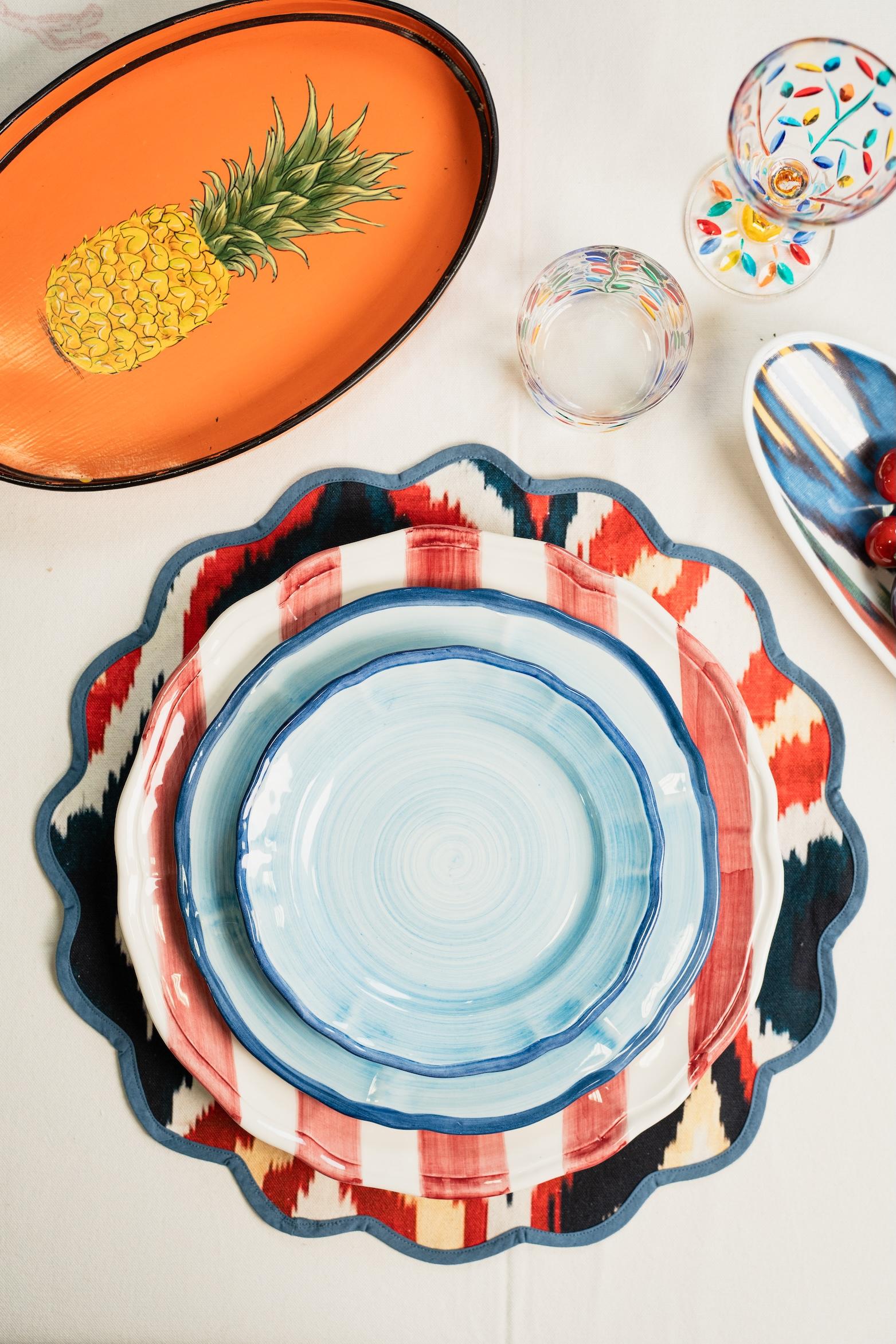 Discover the artistry of Italian craftsmanship with our Hand-Painted Ceramic Plates, featuring a magnificent shaded effect. Available in a range of elegant colors—green, pink, blue, and grey—these plates add a refined touch to any table setting.