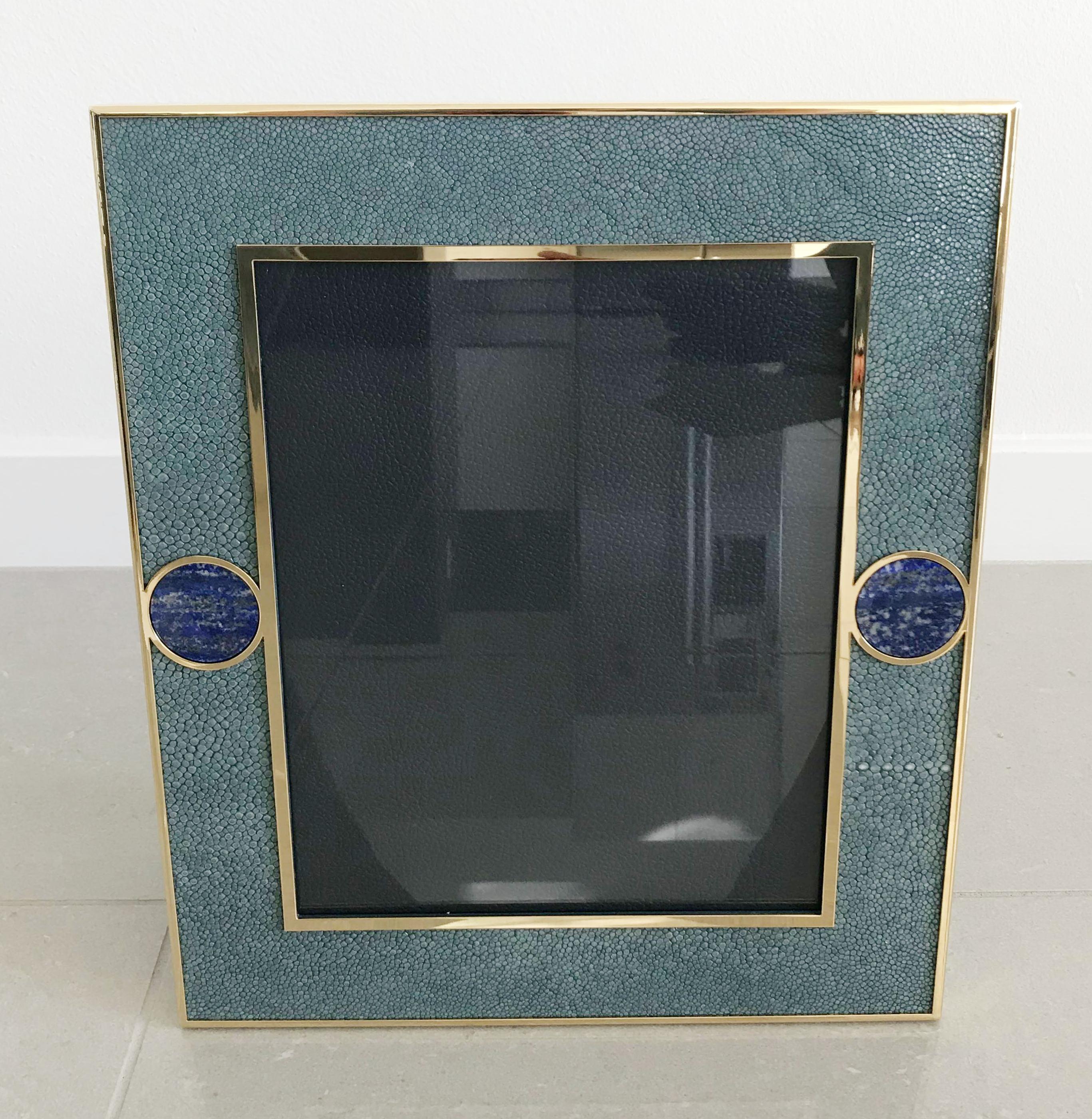Blue shagreen leather with Lapis Lazuli inserts and gold-plated picture frame by Fabio Ltd
Measures: Height 13.5 inches / width 11.5 inches / depth 1 inch
Photo size: 8 inches by 10 inches
LAST 1 in stock in Los Angeles
Order Reference #: FABIOLTD