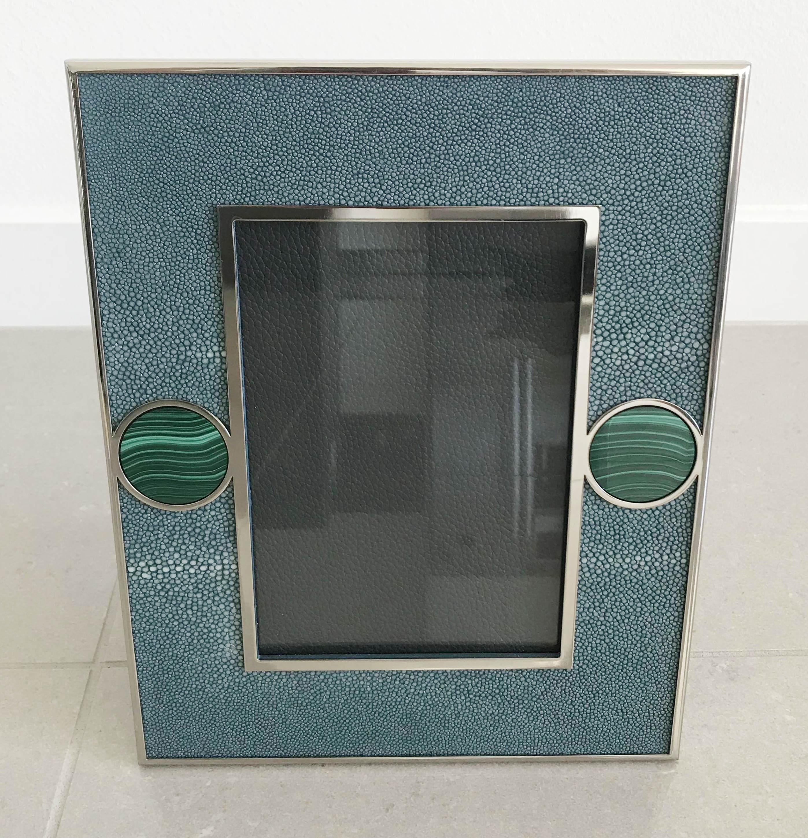 Blue shagreen leather with malachite inserts and nickel-plated picture frame by Fabio Ltd
Measures: Height 10.5 inches, width 8.5 inches, depth 1 inch
Photo size: 5 inches by 7 inches
LAST 1 in stock in Palm Springs ON 30% OFF SALE for $945