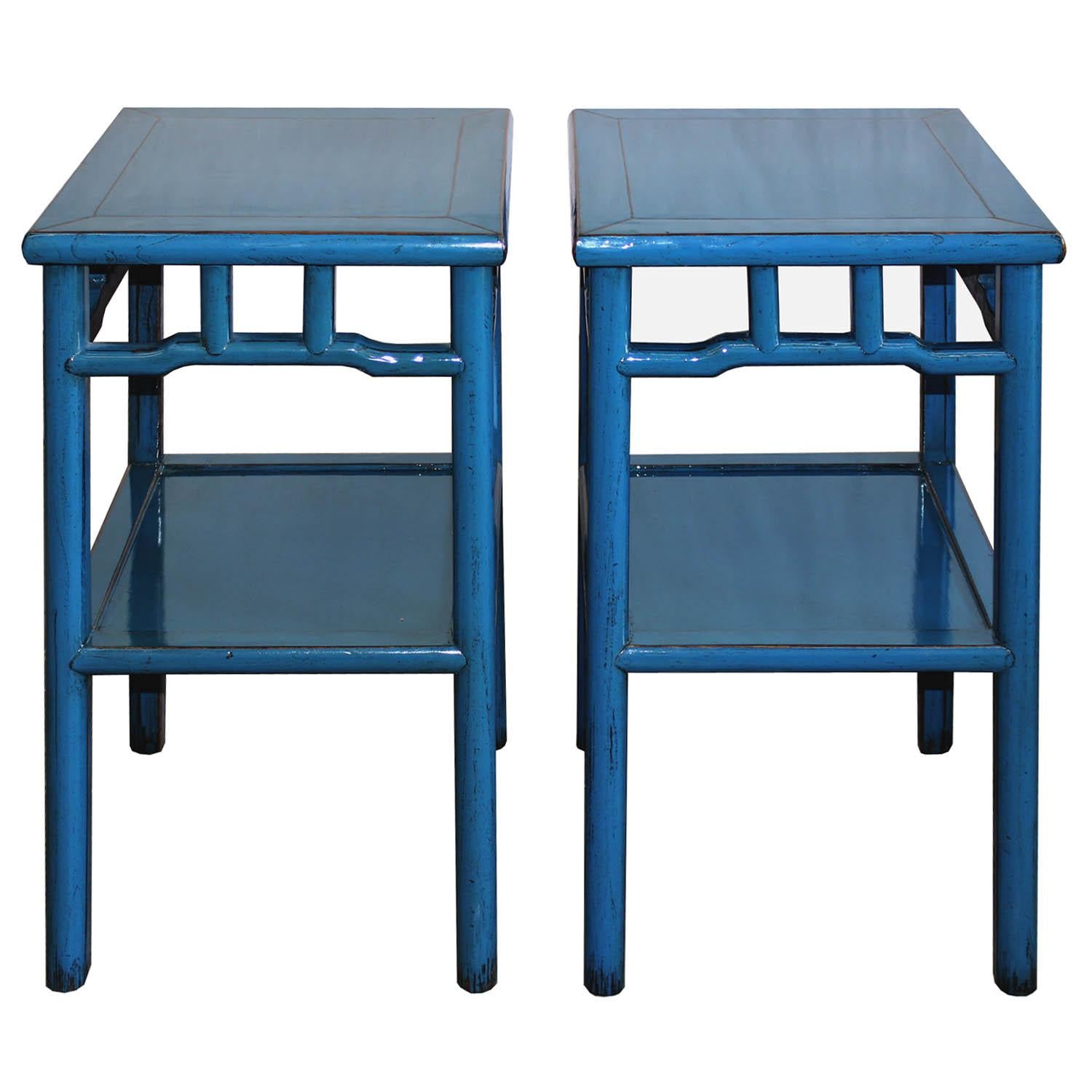 Contemporary blue lacquer end table with exposed wood edges and bottom shelf can be used as bedside tables or in the living room.