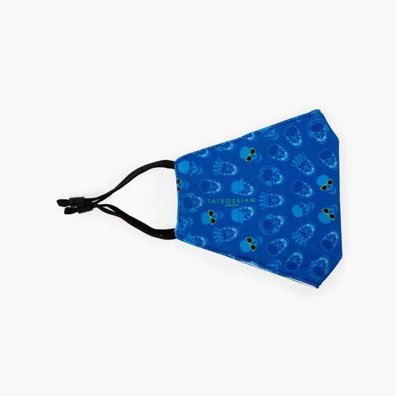 Blue Skull Face Mask

A series of our iconic skulls decorate a cobalt blue, polyester face mask, adding a fun, vibrant style to your daily look. Each face cover offers a washable, reusable and comfortable fit, with black elastic loops, allowing a