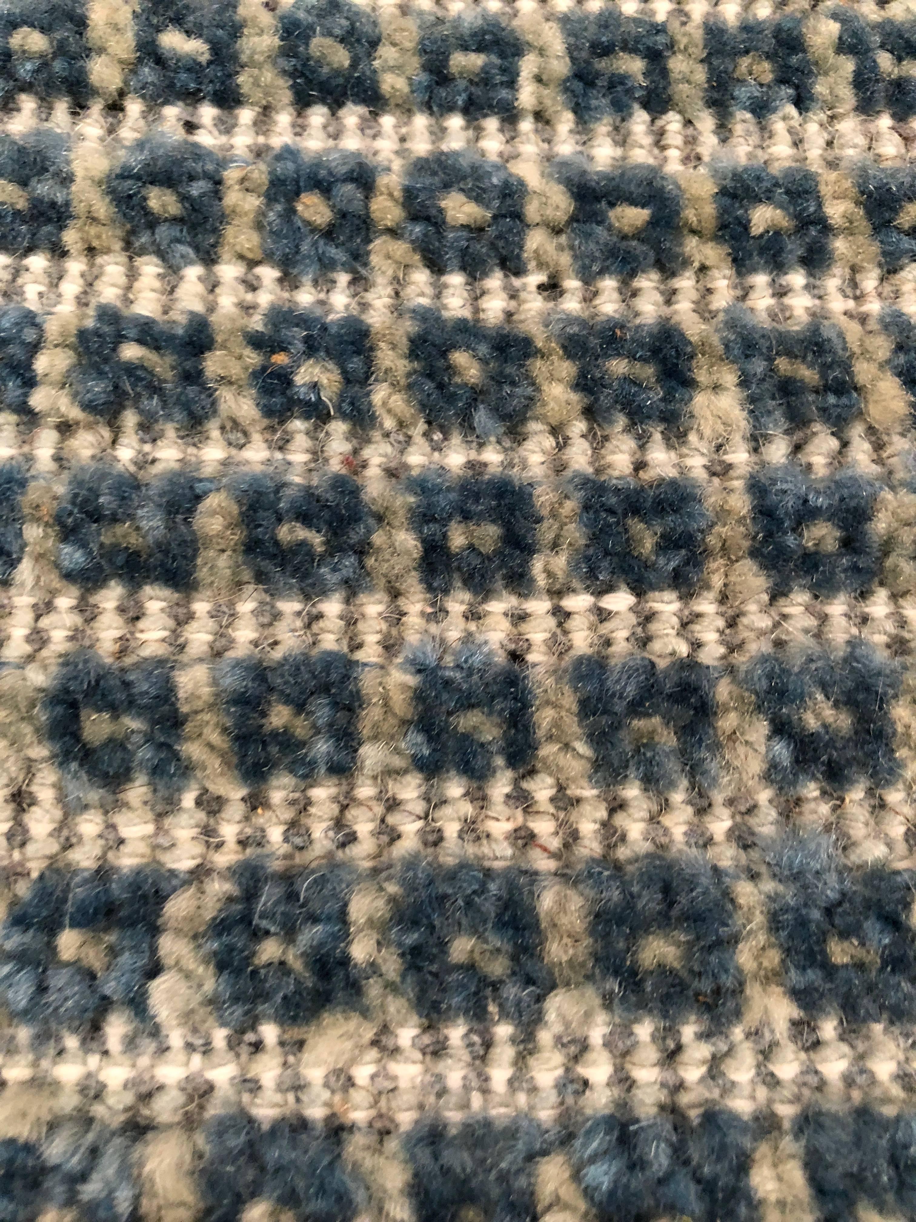 Shades of blues and gray (and even more in ranges of pinks to purples) make this indigo inspired rug one of our best sellers. Durable wool is hand-knotted in a tight weave that provides texture as well as beauty in a room. Because of the dyes used,