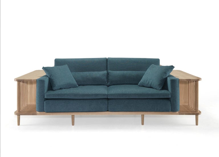 Designer's great comfortable sofa with surrounding wooden frame in solid highest quality wood. A sofa, a bookshelf and also a divider, perfect for an exclusive spac, specialized in designing, manufacturing and exporting solid wood furniture