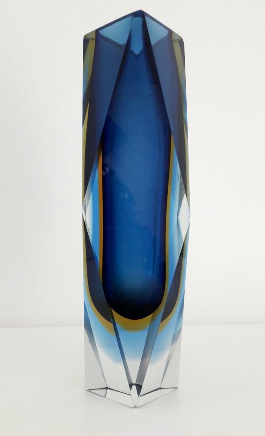Vintage Italian faceted blue Murano glass vase blown in Sommerso technique / Designed by Mandruzzato circa 1960s / Made in Italy.
Measures: Height 12 inches, diameter 5 inches
1 in stock in Italy currently ON HOLIDAY SALE for $999 !!!
Order