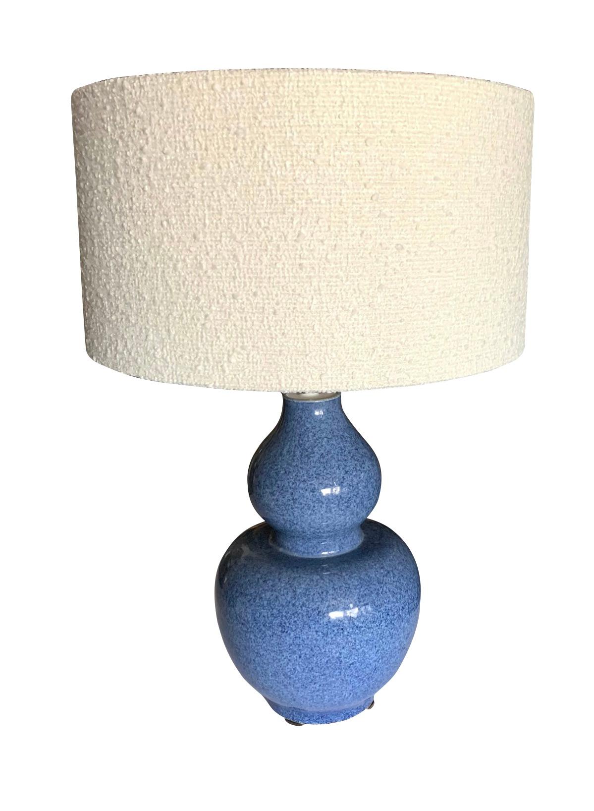 Contemporary Chinese pair speckled blue glaze ceramic vase gourd shaped lamps.
White boucle fabric shades included.
Base measures 8.5