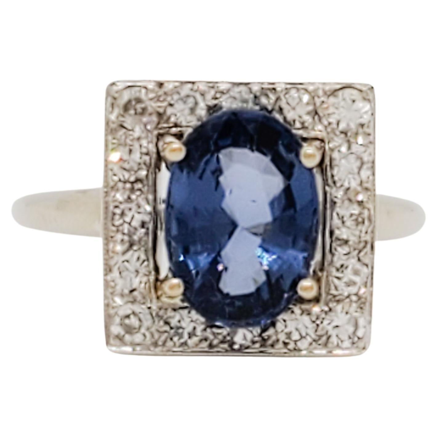 Bague cocktail en or blanc 14k avec spinelle bleue et diamant