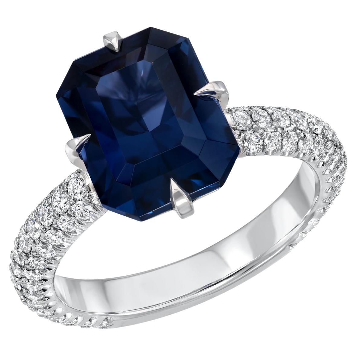 Rare and exquisite 4.01 carat deep blue Spinel emerald cut, nestled in a remarkable three row, 0.80 carat, micro-set diamond ring in platinum.
Ring size 6. Resizing is complementary upon request.
Crafted by extremely skilled hands in the