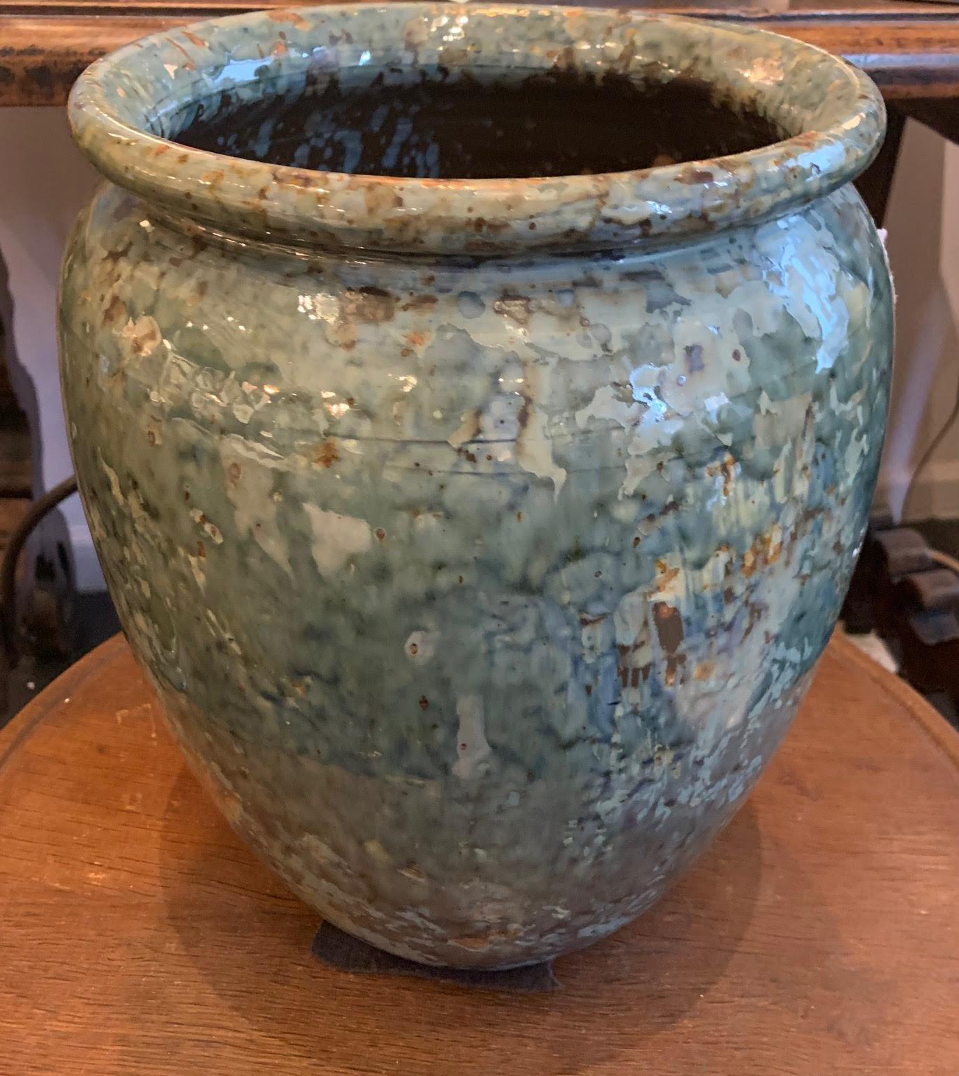 Contemporary Chinese cache pot shaped vase.
Glazed splattered blue colors.