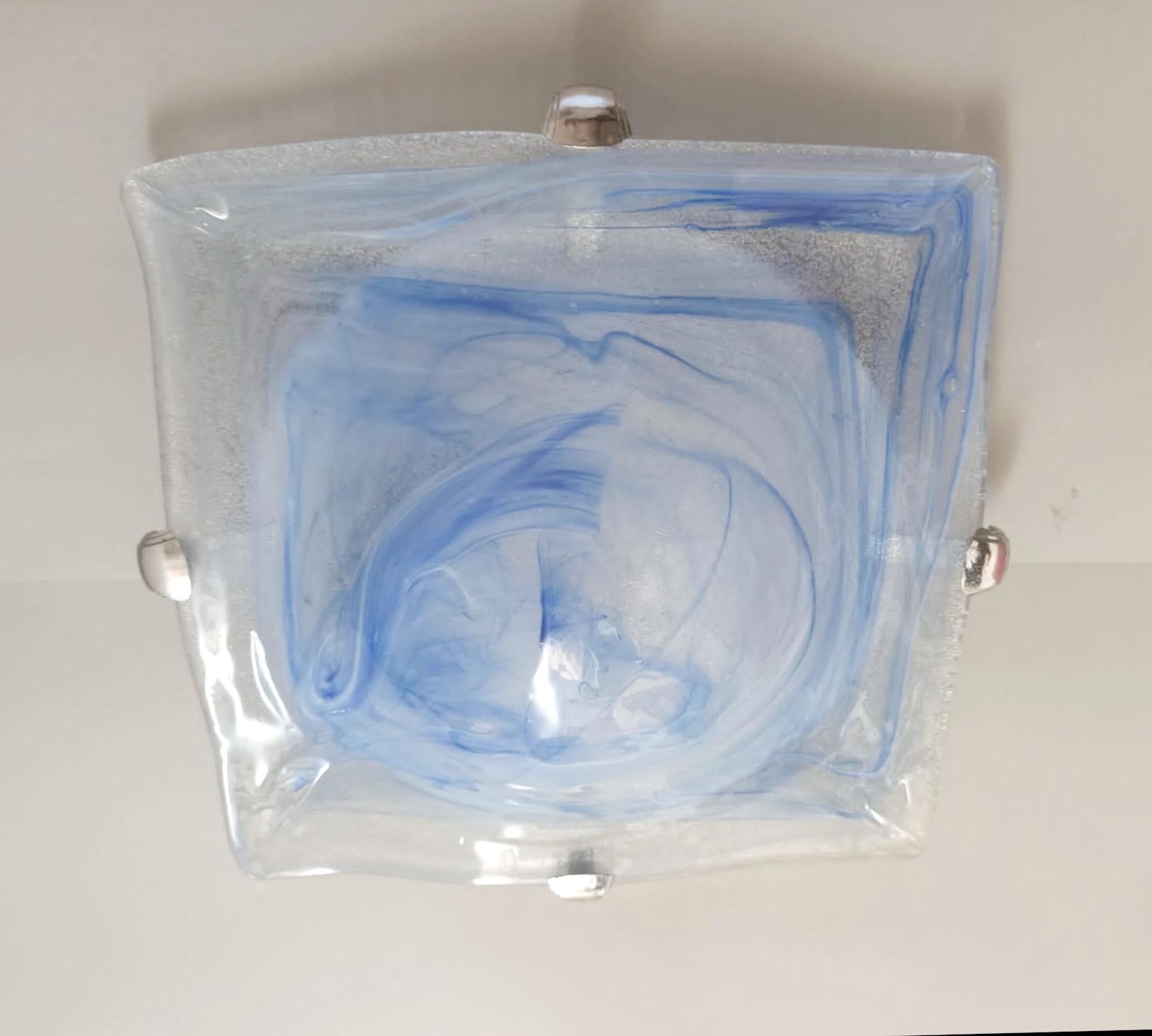 Vintage Italian flush mount or wall light with a single square graniglia Murano glass shade and blue decoration / Made in Italy in the style of Mazzega, circa 1960s
Measures: width 12 inches, length 12 inches, height 3.5 inches
1 light / E26 or E27