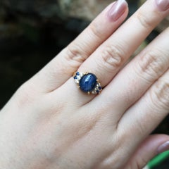 Blue Star Sapphire, Blue Sapphire and Diamond Ring set in 18K Gold Settings