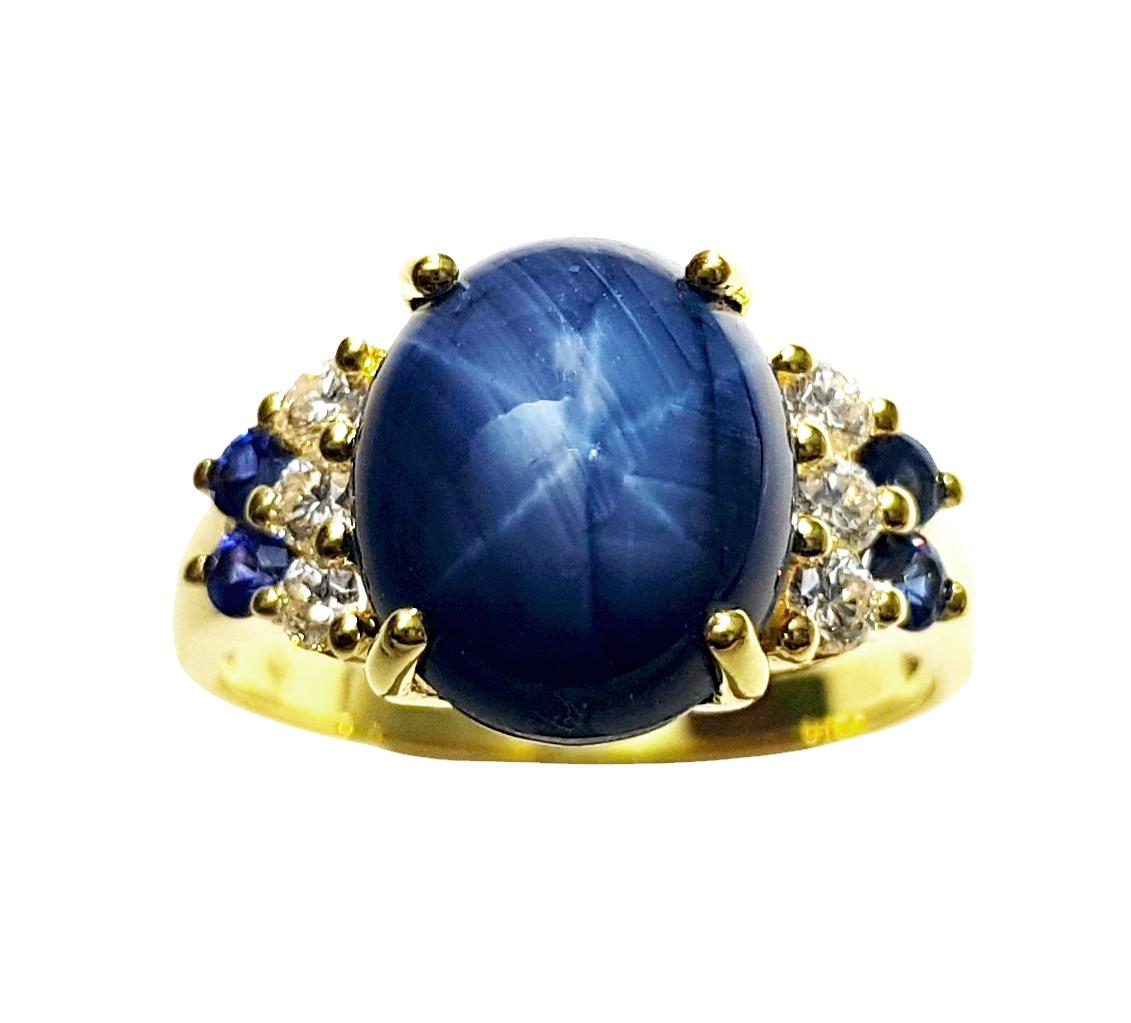 Women's Blue Star Sapphire, Blue Sapphire and Diamond Ring set in 18K Gold Settings For Sale