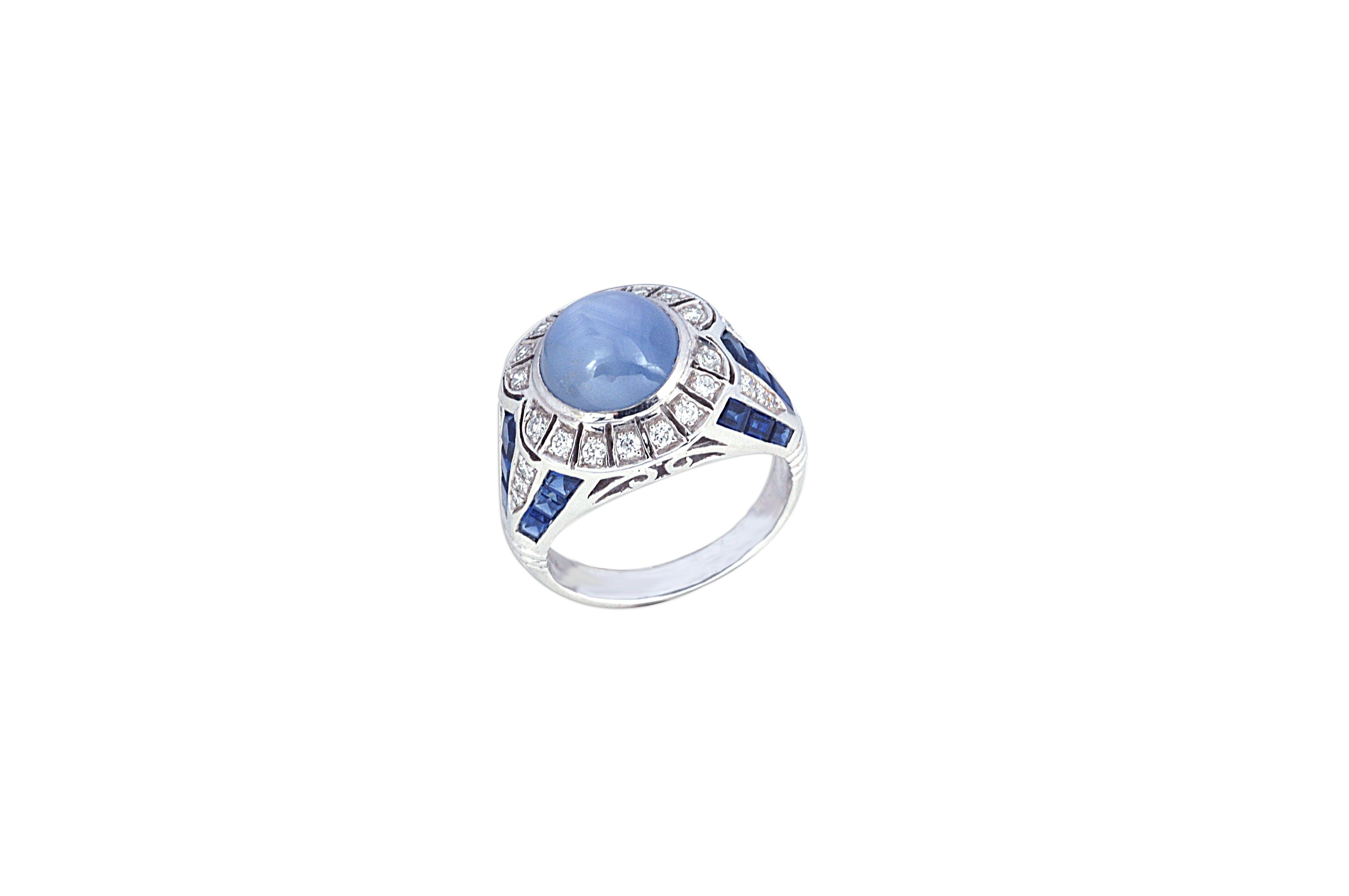 Blue Star Sapphire 7.47 carats, Blue Sapphire 3.54 carats with Diamond 0.44 ct Ring in 18 karat White Gold Settings

Width: 1.5 cm
Length: 1.8 cm
Ring Size: 54
Total Weight: 6.98 grams

