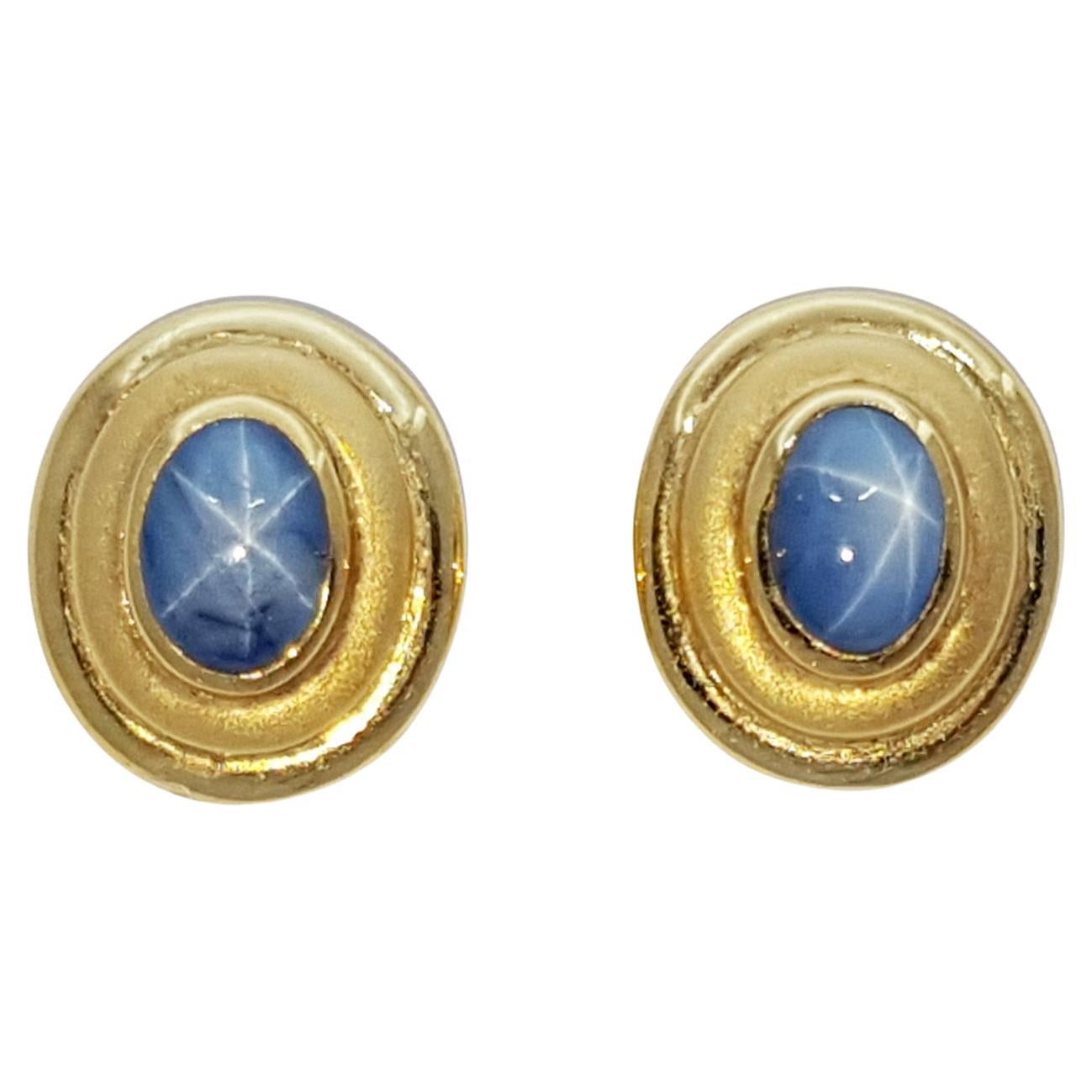 Blue Star Sapphire  Earrings set in 18 Karat Gold Settings For Sale