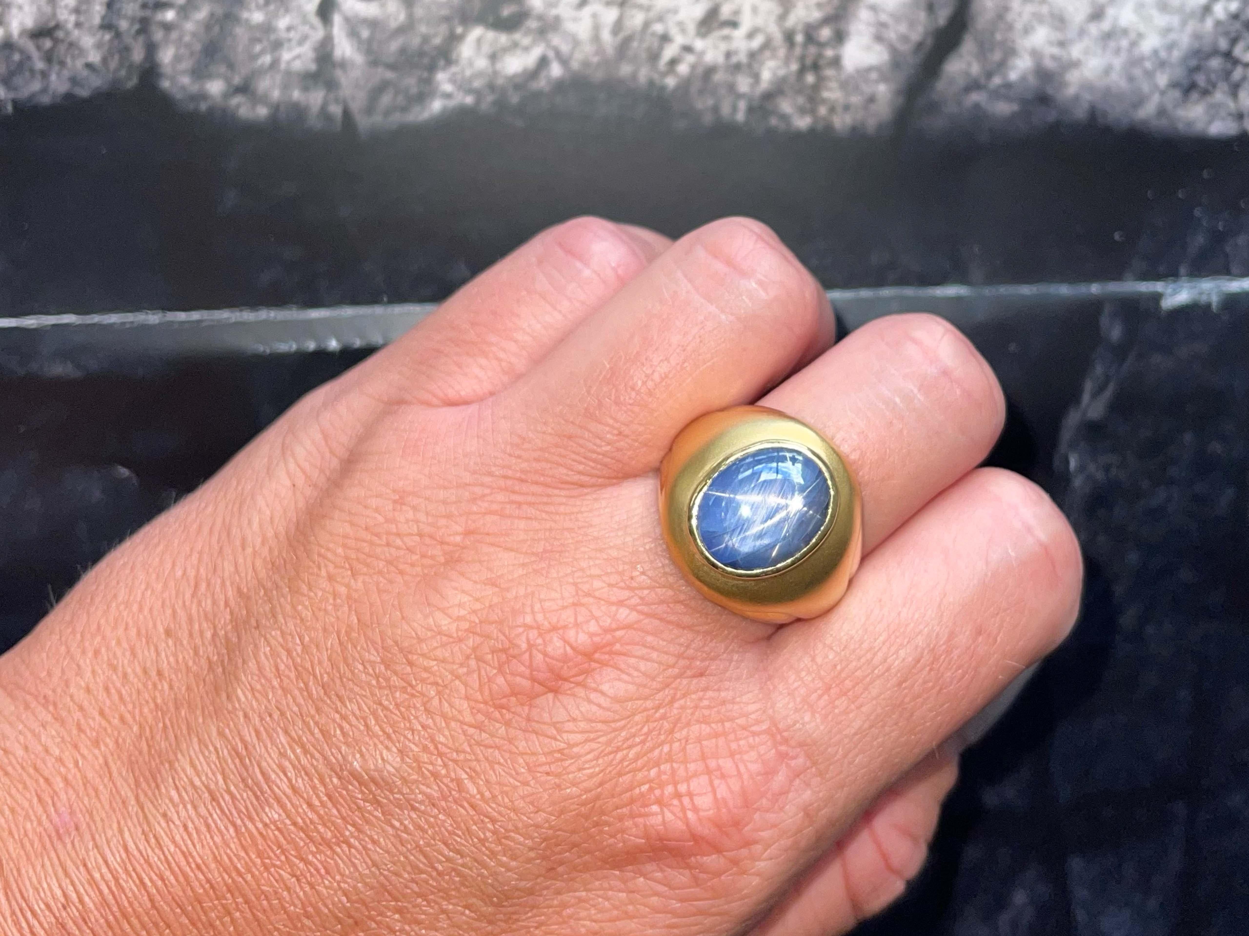 Ring Specifications:

Metal: 18k Yellow Gold

Total Weight: 20.8 Grams

Star Sapphire Measurements: 14.9 mm x 12.18 mm x 6.30 mm 

Star Sapphire Carat Weight: ~8.48 carats

Ring Size: 10 (resizable)

Stamped:  