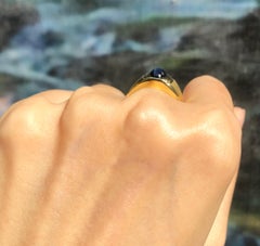 Blue Star Sapphire Ring Set in 14 Karat Gold Settings