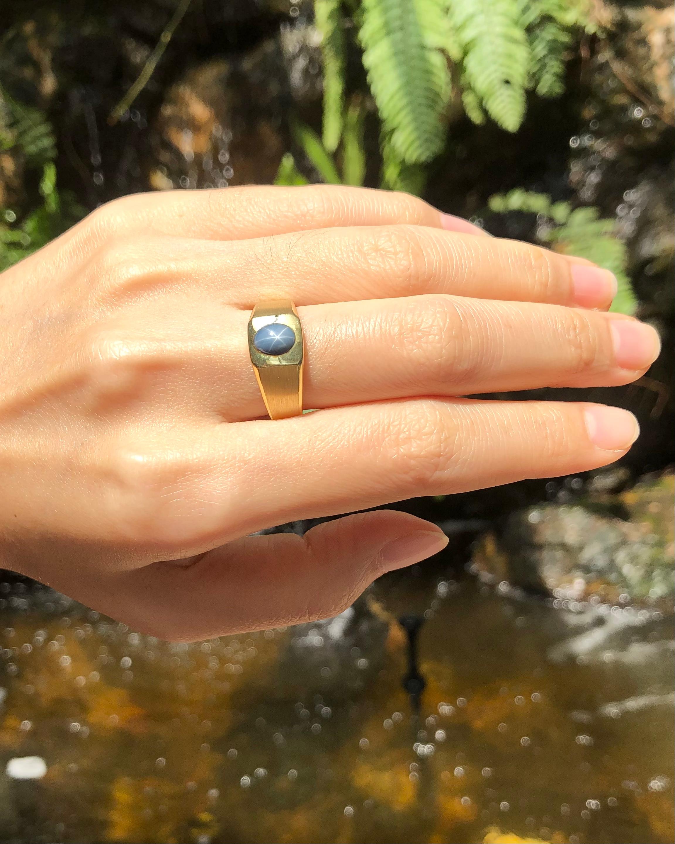 Cabochon Blue Star Sapphire Ring Set in 14 Karat Gold Settings For Sale