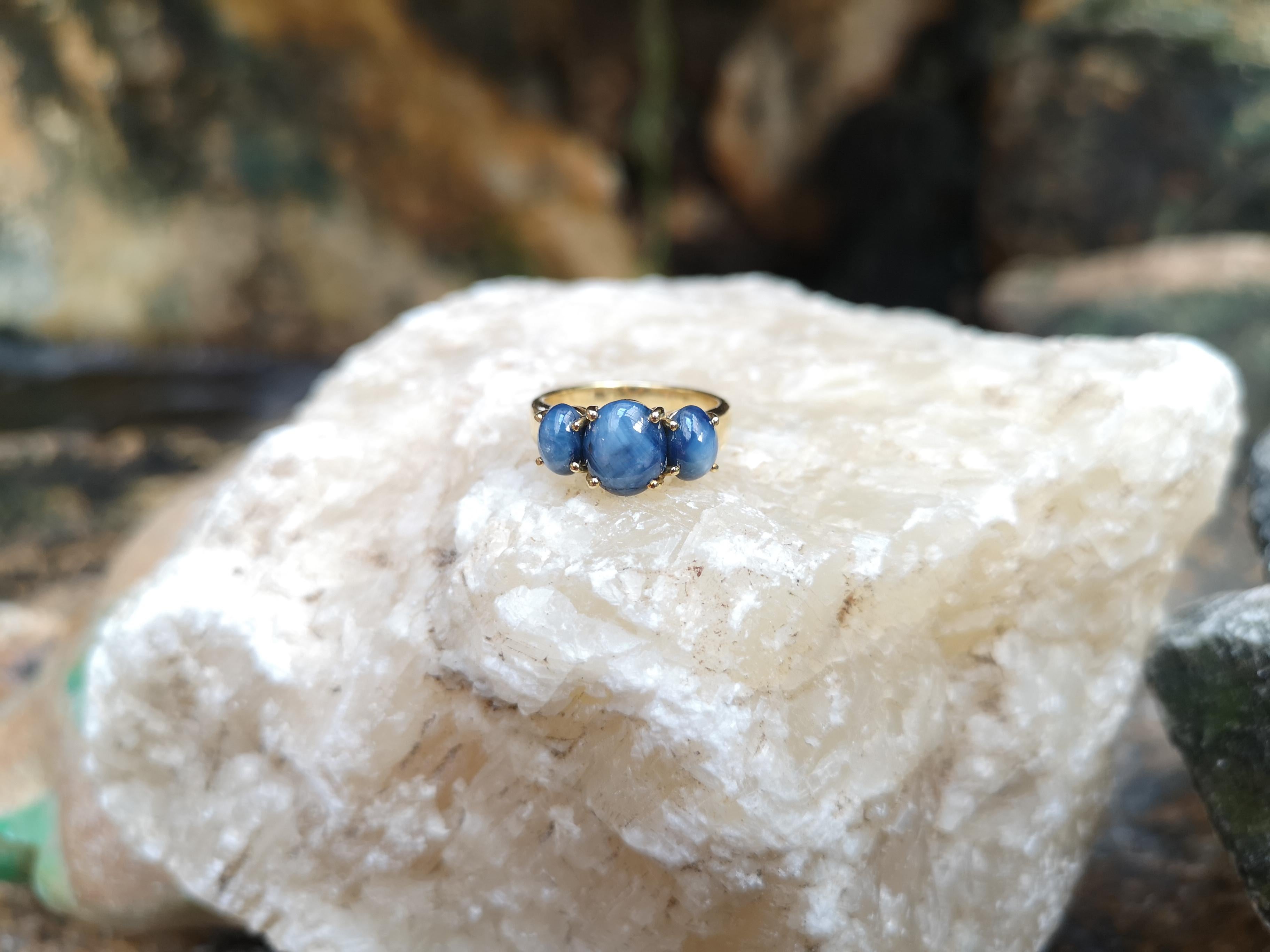 Cabochon Blue Star Sapphire Ring Set in 18 Karat Gold Settings