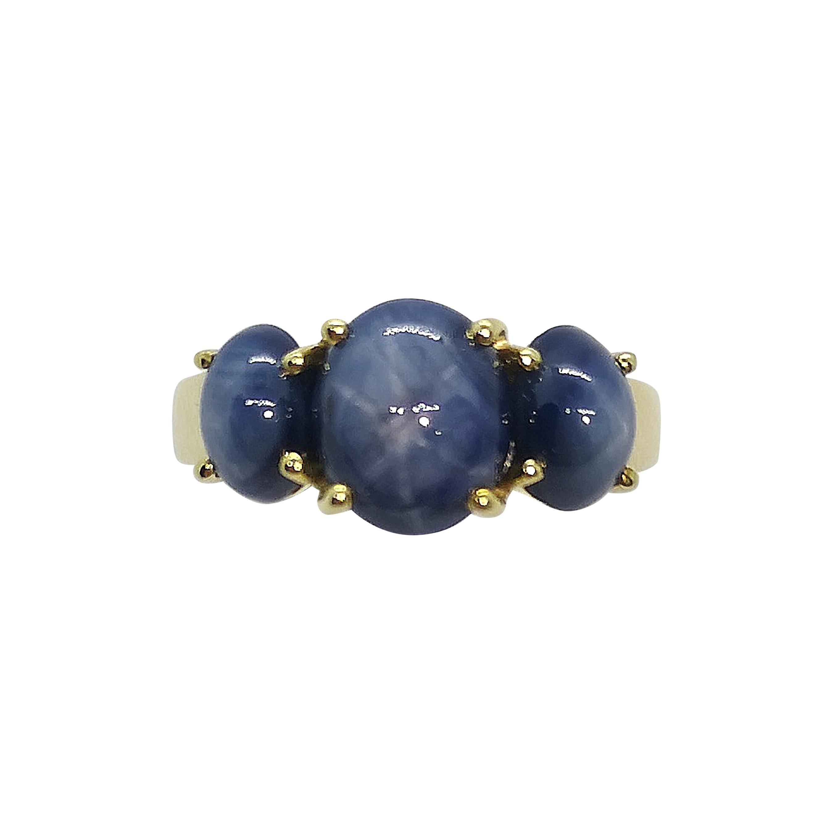 Blue Star Sapphire Ring Set in 18 Karat Gold Settings