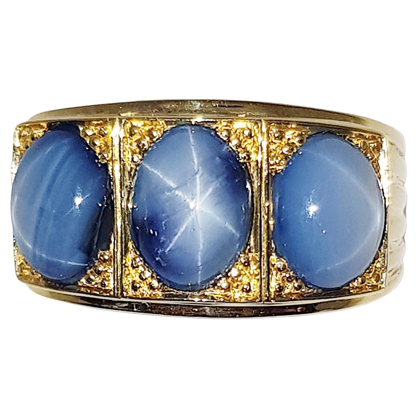 Blue Star Sapphire Ring set in 18 Karat Gold Settings For Sale