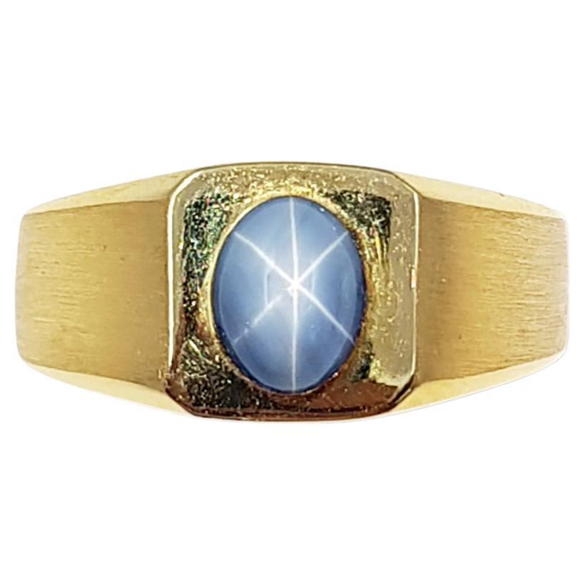 Blue Star Sapphire Ring Set in 18 Karat Gold Settings