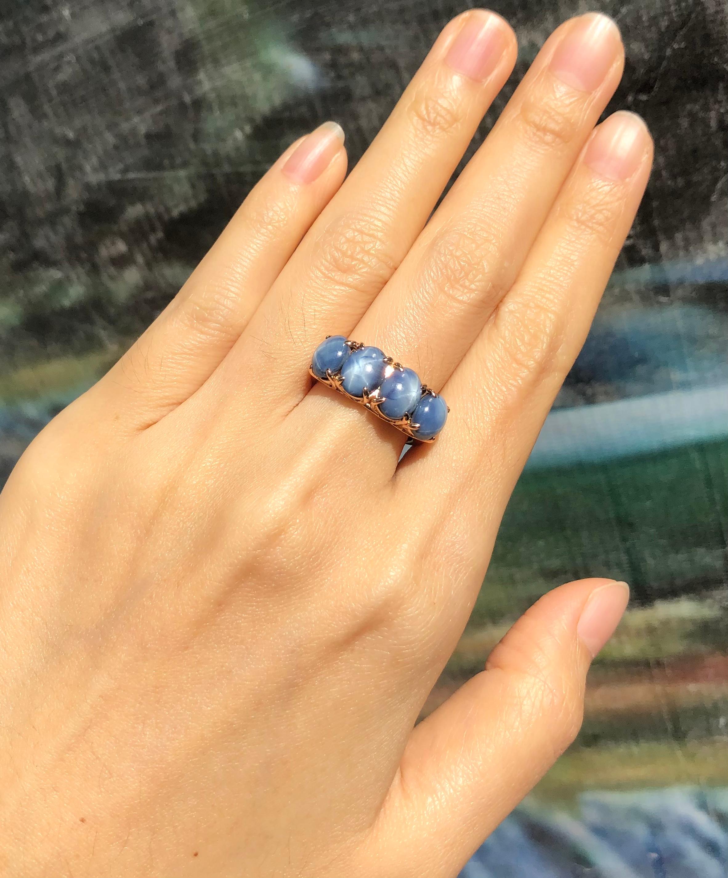 Women's or Men's Blue Star Sapphire Ring Set in 18 Karat Rose Gold Settings For Sale