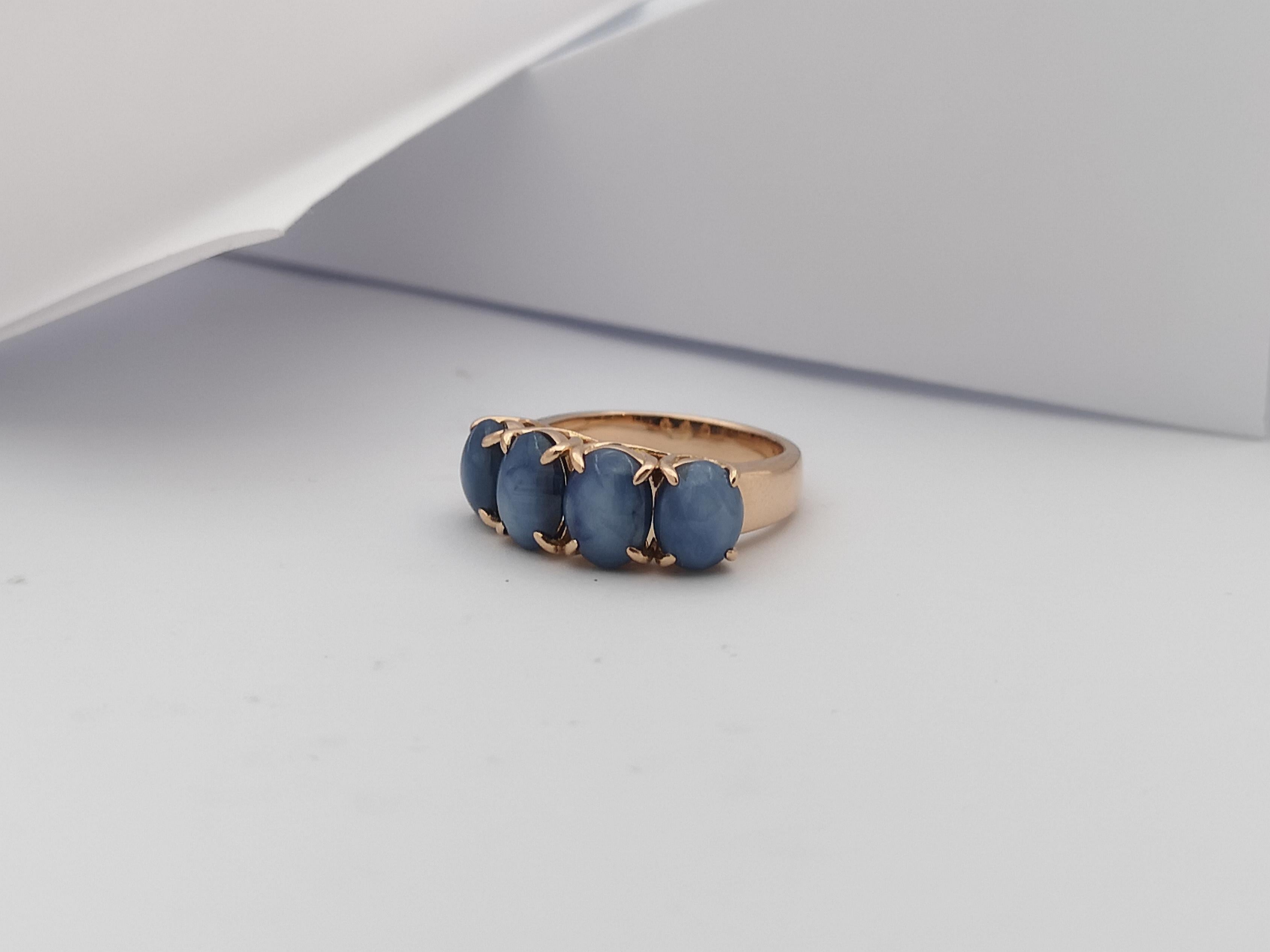 Blue Star Sapphire Ring Set in 18 Karat Rose Gold Settings For Sale 3