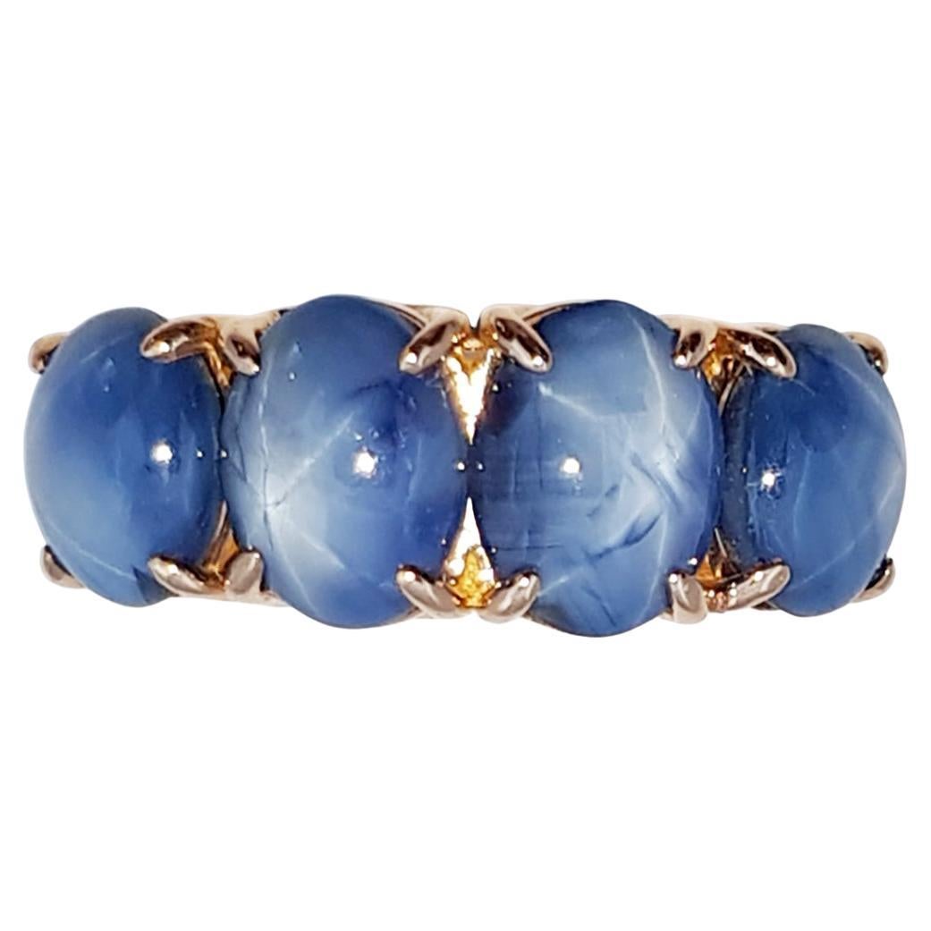Blue Star Sapphire Ring Set in 18 Karat Rose Gold Settings For Sale