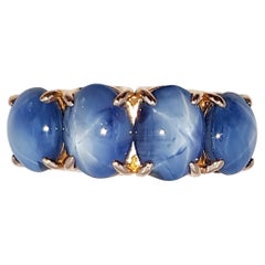 Blue Star Sapphire Ring Set in 18 Karat Rose Gold Settings