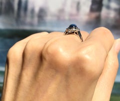 Blue Star Sapphire Ring Set in 18 Karat White Gold Settings