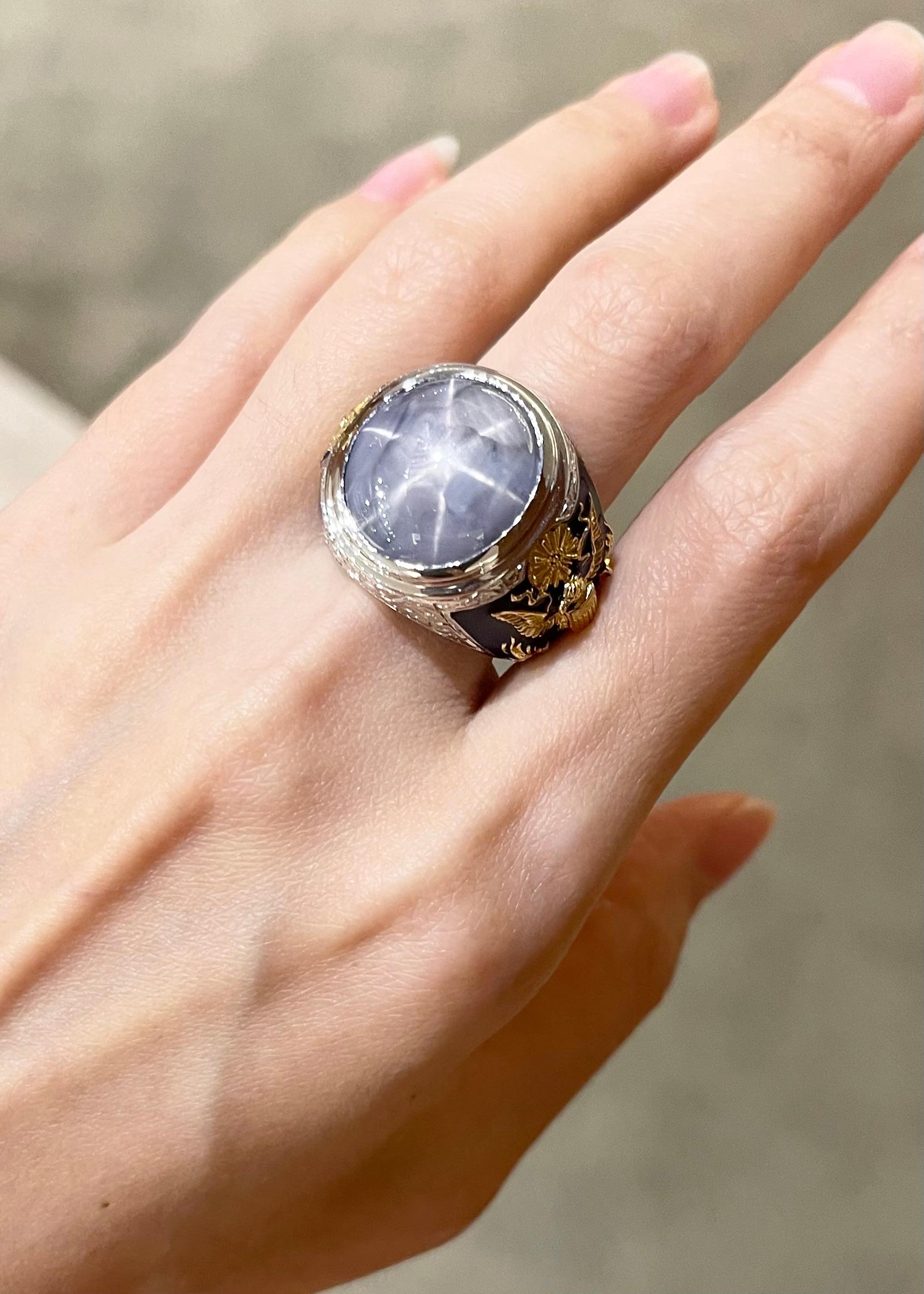Contemporary Blue Star Sapphire Ring set in 18K White Gold Settings For Sale
