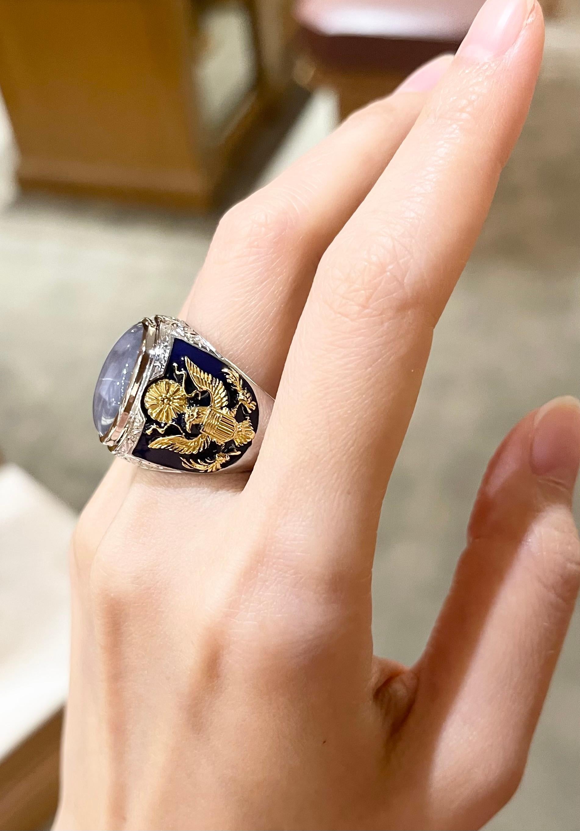 Cabochon Blue Star Sapphire Ring set in 18K White Gold Settings For Sale