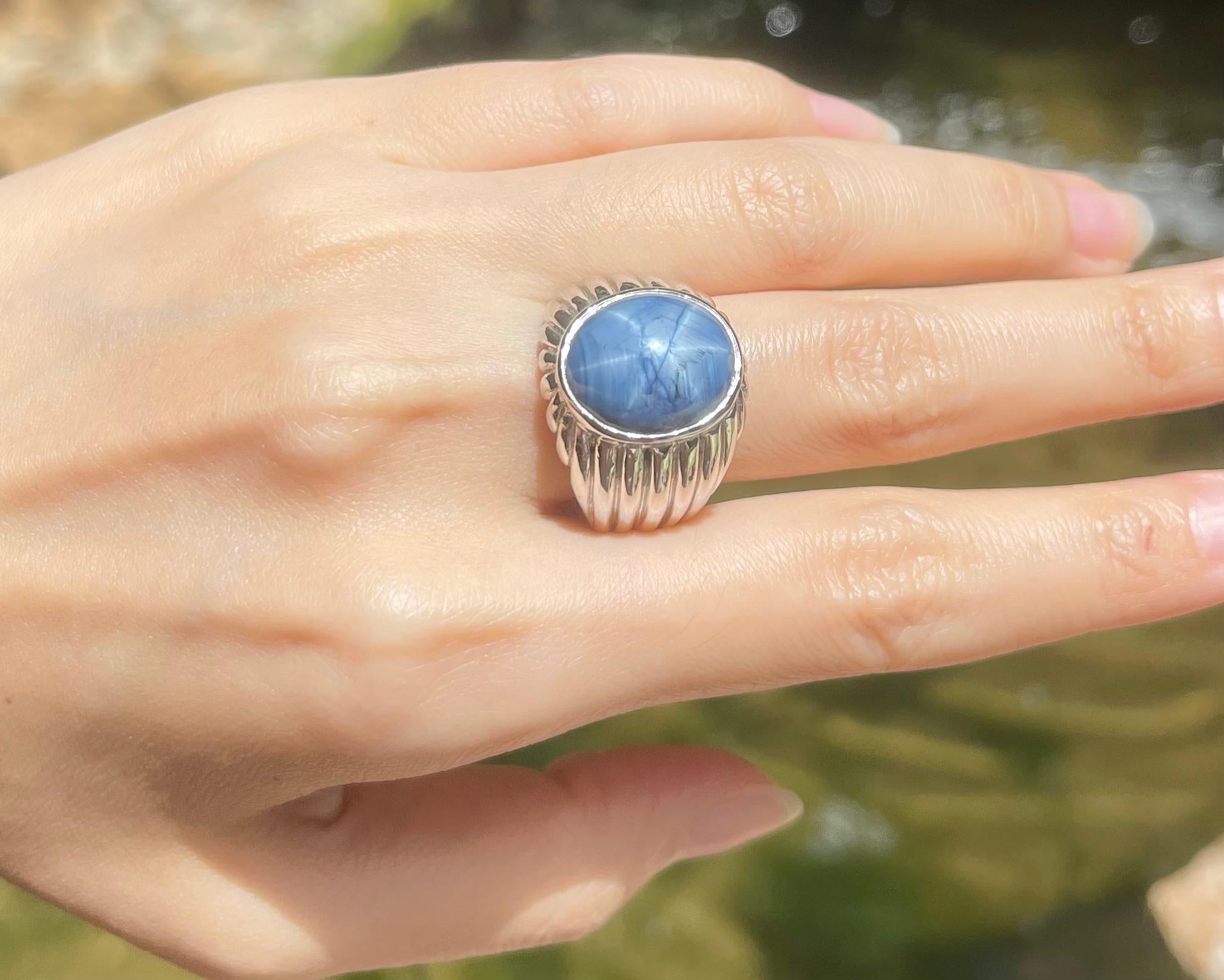 Contemporary Blue Star Sapphire Ring set in Platinum 950 Settings For Sale