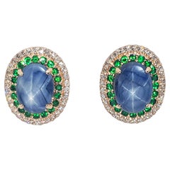 Pendientes de zafiro estrella azul, tsavorita y diamante marrón engastados en oro rosa de 18 quilates