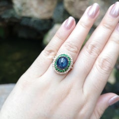 Blue Star Sapphire, Tsavorite and Brown Diamond Ring set in 18K Rose Gold