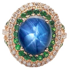 Blue Star Sapphire, Tsavorite and Brown Diamond Ring set in 18K Rose Gold