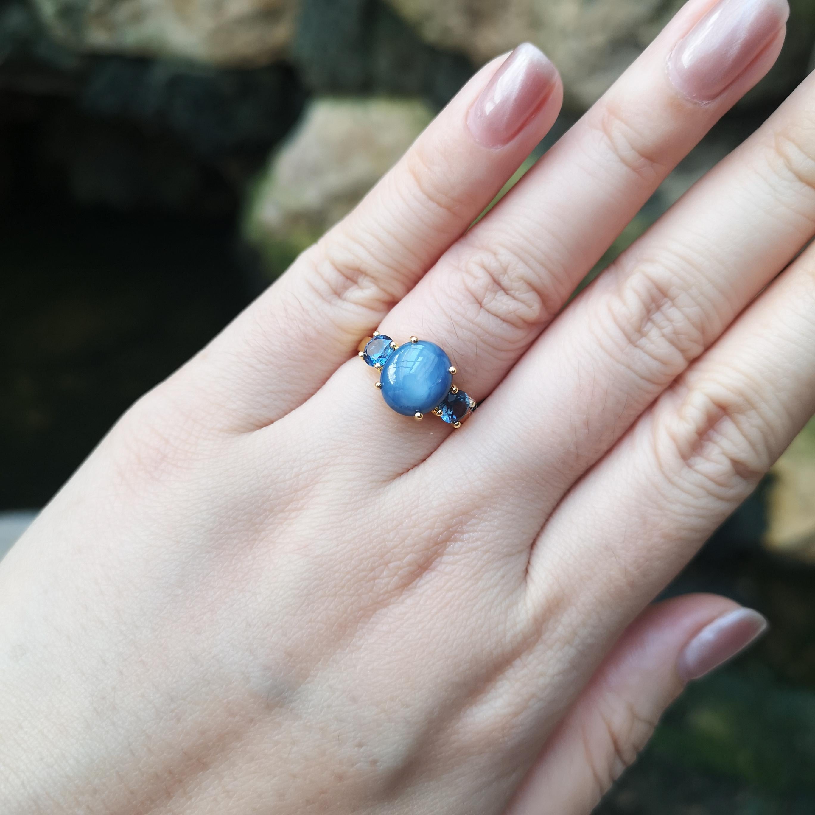 Blue Star Sapphire 5.54 carats with Blue Sapphire 0.99 carat Ring set in 18K Gold Settings

Width:  1.7 cm 
Length: 1.0 cm
Ring Size: 54
Total Weight: 4.68 grams

