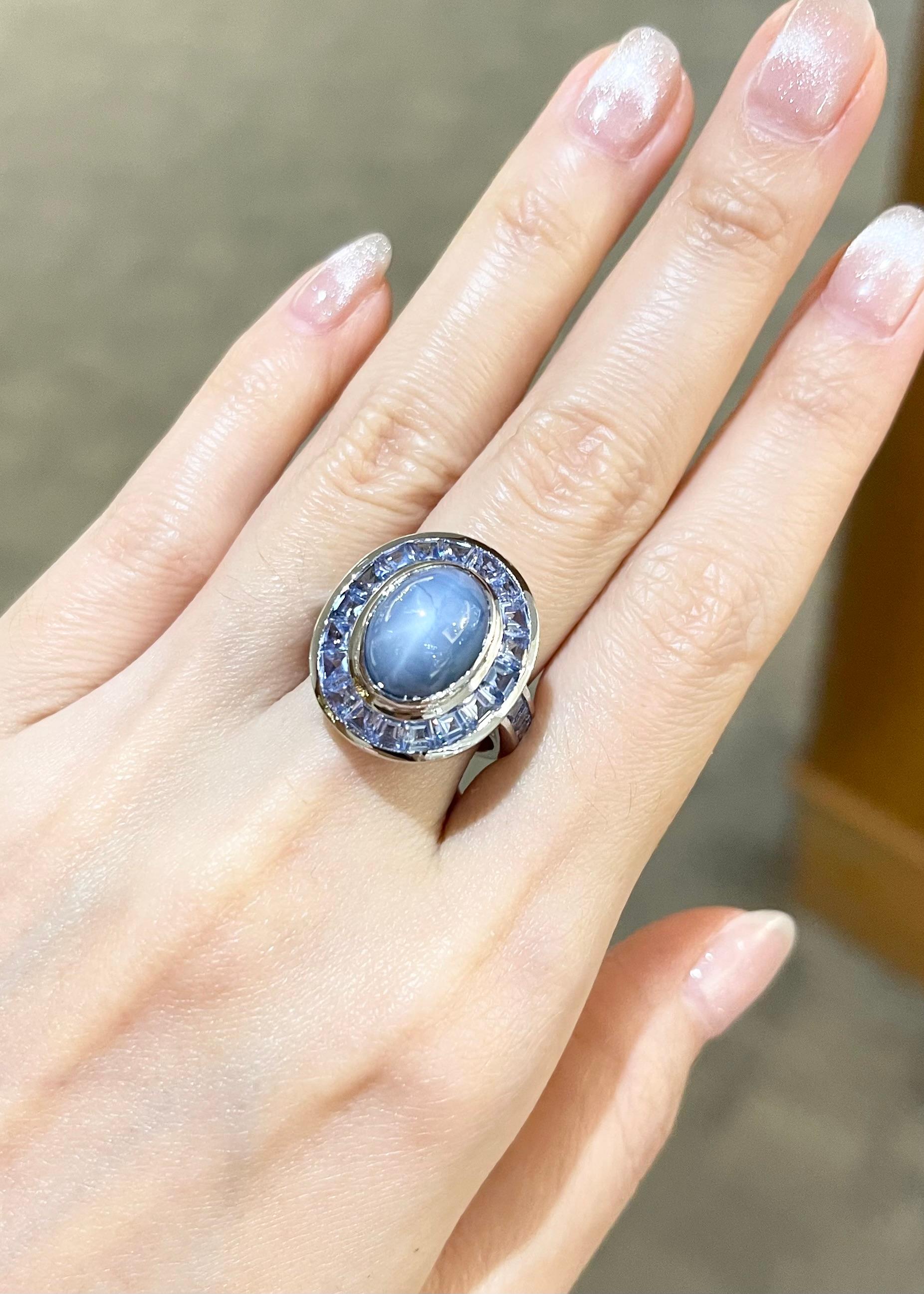 Blue Star Sapphire 9.03 carats with Blue Sapphire 3.50 carat Ring set in 18K White Gold Settings

Width:  1.8 cm 
Length: 2.1 cm
Ring Size: 53
Total Weight: 13.05 grams

