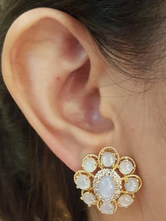 Blue Star Sapphire with Brown Diamond Earrings Set in 18 Karat Gold Settings