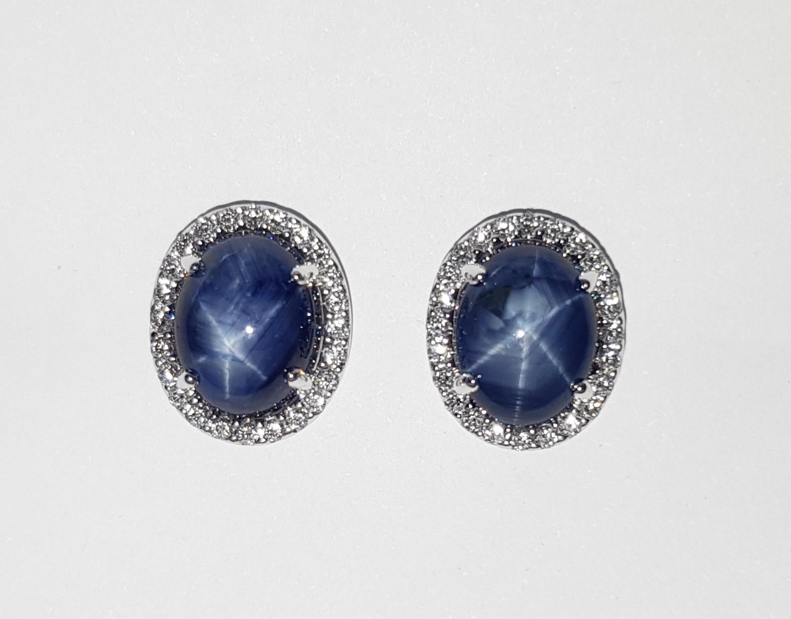 Contemporary Blue Star Sapphire with Diamond Earrings set in 18K White Gold Settings For Sale